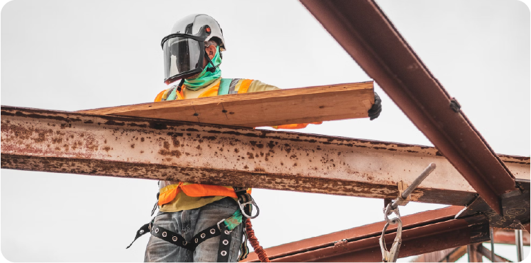 Construction worker on steel beams